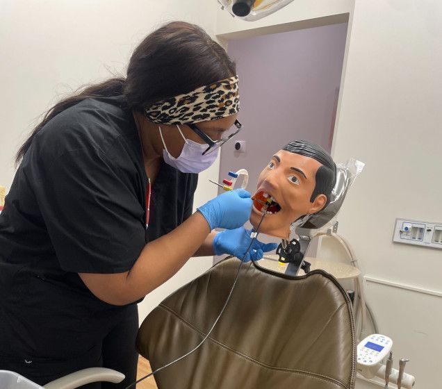 Birmingham Dental Assistant School student training to capture dental x-rays